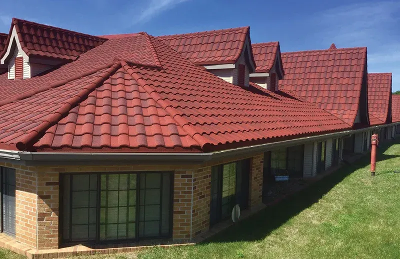 South Jersey Red tiled roofs on brick buildings under blue sky