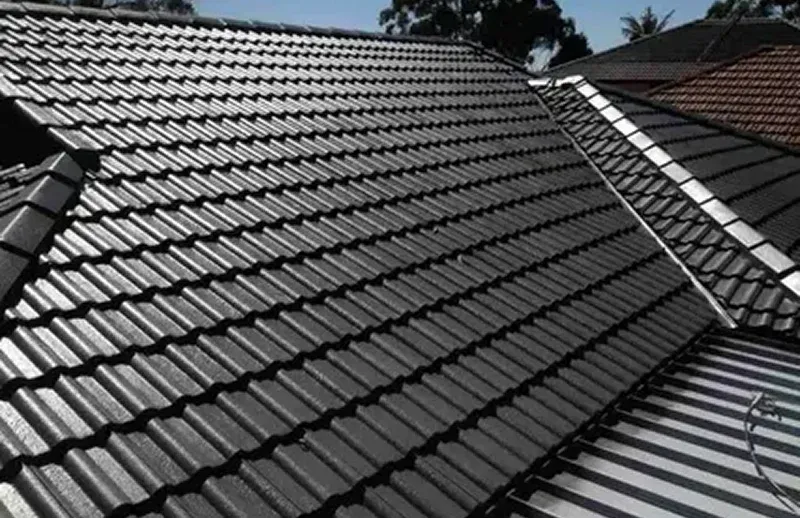 Camden Roof with black tiles and multiple slopes